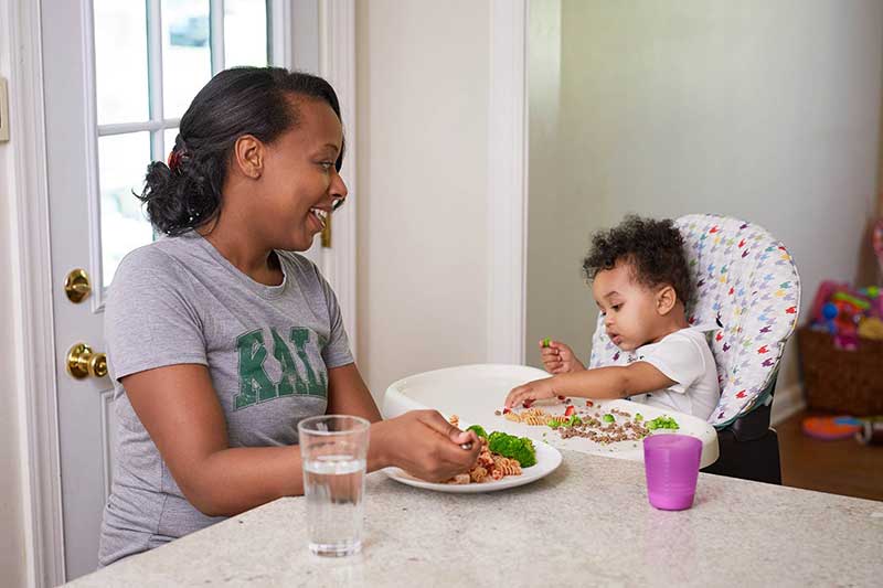 12 month old eating family meal